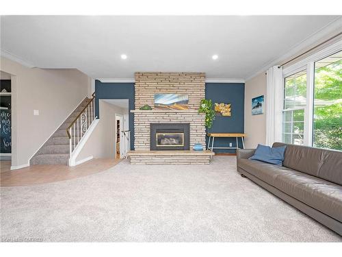 520 Concession 3 Road, Wilsonville, ON - Indoor Photo Showing Living Room With Fireplace