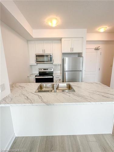 213-460 Dundas Street E, Hamilton, ON - Indoor Photo Showing Kitchen With Double Sink