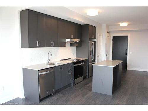 1602-3220 William Coltson Avenue, Oakville, ON - Indoor Photo Showing Kitchen With Stainless Steel Kitchen With Upgraded Kitchen