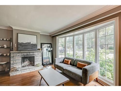 548 Swann Drive, Oakville, ON - Indoor Photo Showing Living Room With Fireplace