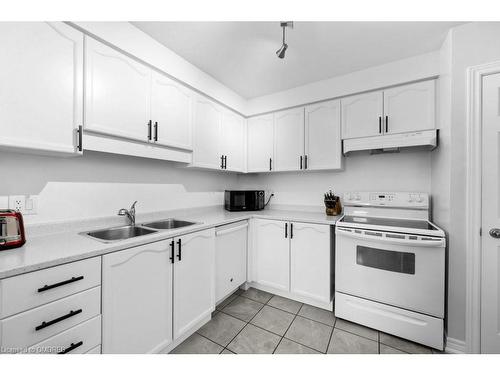 16-391 Stone Church Road E, Hamilton, ON - Indoor Photo Showing Kitchen With Double Sink