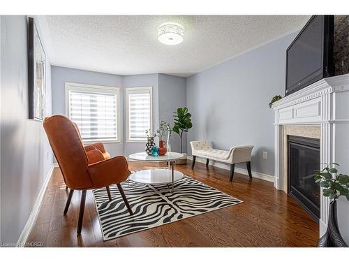 557 Settlers Road W, Oakville, ON - Indoor Photo Showing Living Room With Fireplace