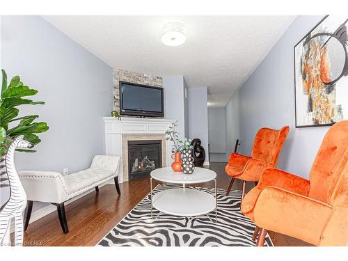 557 Settlers Road W, Oakville, ON - Indoor Photo Showing Living Room With Fireplace