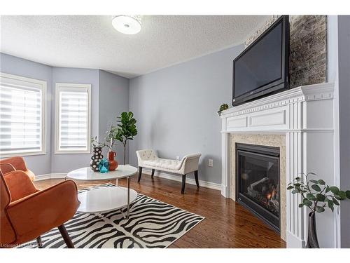 557 Settlers Road W, Oakville, ON - Indoor Photo Showing Living Room With Fireplace