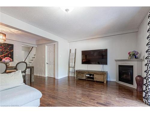 8-2062 Lakeshore Road W, Oakville, ON - Indoor Photo Showing Living Room With Fireplace