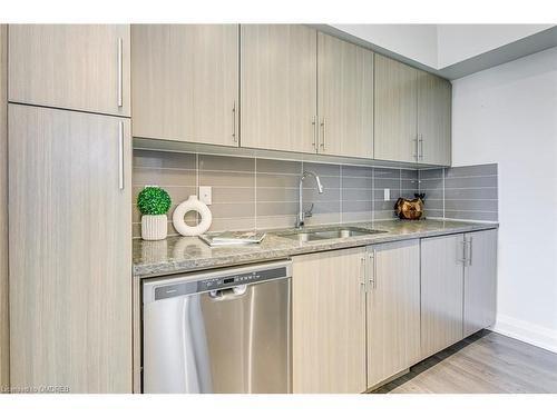 205-65 Speers Road, Oakville, ON - Indoor Photo Showing Kitchen With Double Sink