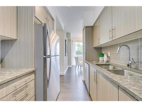 205-65 Speers Road, Oakville, ON - Indoor Photo Showing Kitchen With Double Sink