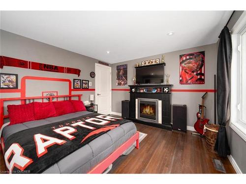 18 Fagan Drive, Georgetown, ON - Indoor Photo Showing Bedroom With Fireplace