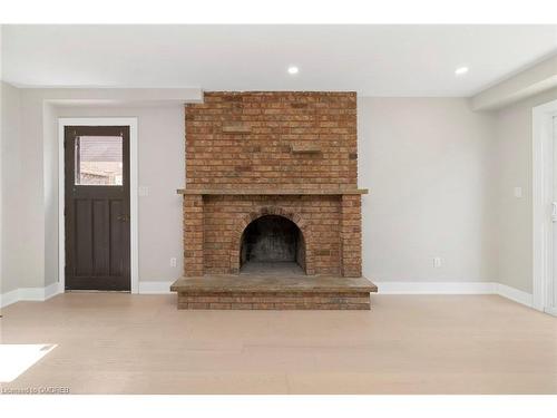 49 Spartan Avenue, Hamilton, ON - Indoor Photo Showing Living Room With Fireplace