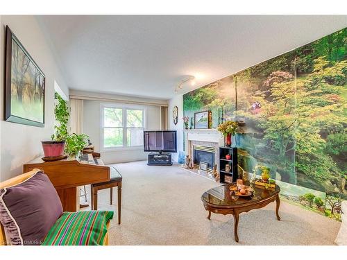 24 Westland Street, St. Catharines, ON - Indoor Photo Showing Living Room With Fireplace