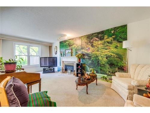 24 Westland Street, St. Catharines, ON - Indoor Photo Showing Living Room With Fireplace