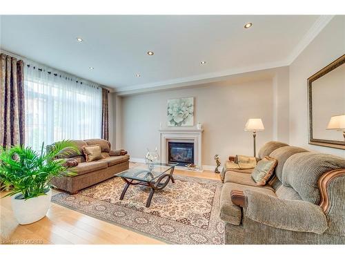 2395 Thruxton Drive, Oakville, ON - Indoor Photo Showing Living Room With Fireplace