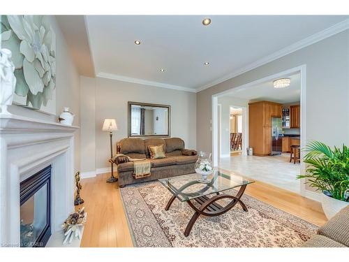 2395 Thruxton Drive, Oakville, ON - Indoor Photo Showing Living Room With Fireplace