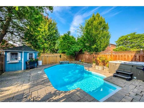 1125 Windrush Drive, Oakville, ON - Outdoor With In Ground Pool With Deck Patio Veranda With Backyard