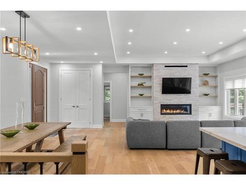 185 Desroches Trail, Tiny, ON - Indoor Photo Showing Living Room With Fireplace