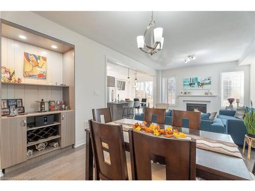 3094 Blackfriar Common, Oakville, ON - Indoor Photo Showing Dining Room With Fireplace