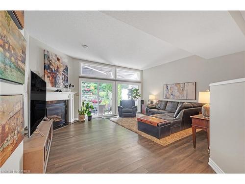 8-177 Main Street W, Grimsby, ON - Indoor Photo Showing Living Room With Fireplace