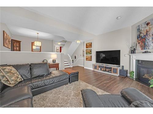 8-177 Main Street W, Grimsby, ON - Indoor Photo Showing Living Room With Fireplace