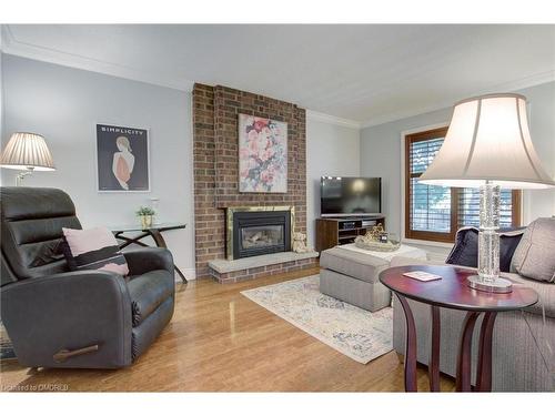 1760 Solitaire Court, Mississauga, ON - Indoor Photo Showing Living Room With Fireplace