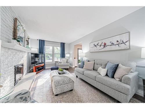 557 Holly Avenue, Milton, ON - Indoor Photo Showing Living Room With Fireplace