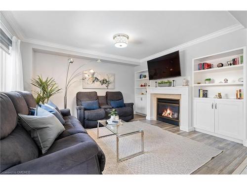 19 Mcnally Street, Georgetown, ON - Indoor Photo Showing Living Room With Fireplace