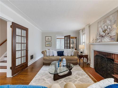 4 St Andrews Avenue, Grimsby, ON - Indoor Photo Showing Living Room With Fireplace