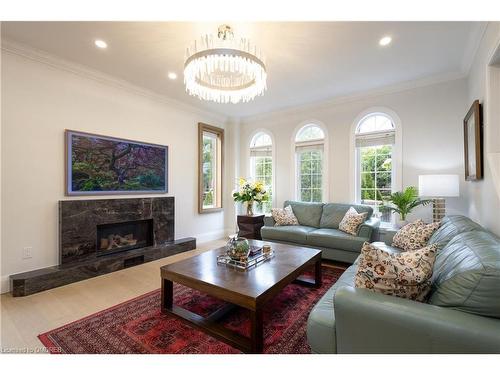 Upper-2429 Aztec Gate, Oakville, ON - Indoor Photo Showing Living Room With Fireplace