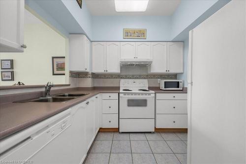 2510-100 Burloak Drive, Burlington, ON - Indoor Photo Showing Kitchen With Double Sink