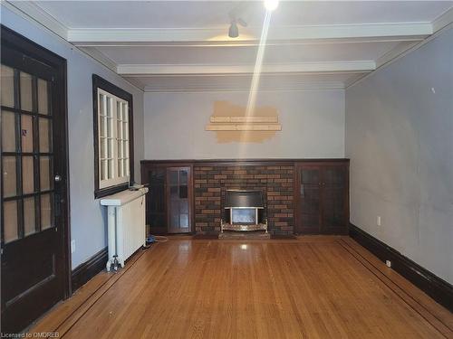 69 South Oval, Hamilton, ON - Indoor With Fireplace