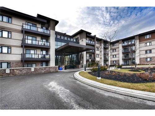 221-128 Garden Drive, Oakville, ON - Outdoor With Balcony With Facade