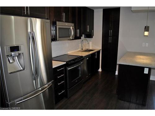 221-128 Garden Drive, Oakville, ON - Indoor Photo Showing Kitchen With Stainless Steel Kitchen