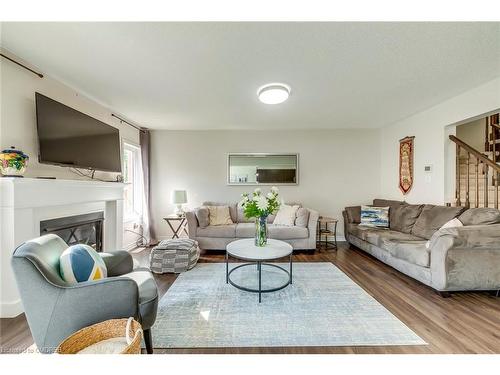 1663 Clitherow Street, Milton, ON - Indoor Photo Showing Living Room With Fireplace