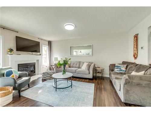 1663 Clitherow Street, Milton, ON - Indoor Photo Showing Living Room With Fireplace