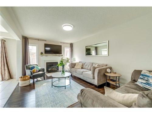 1663 Clitherow Street, Milton, ON - Indoor Photo Showing Living Room With Fireplace