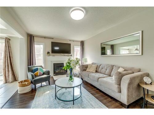 1663 Clitherow Street, Milton, ON - Indoor Photo Showing Living Room With Fireplace