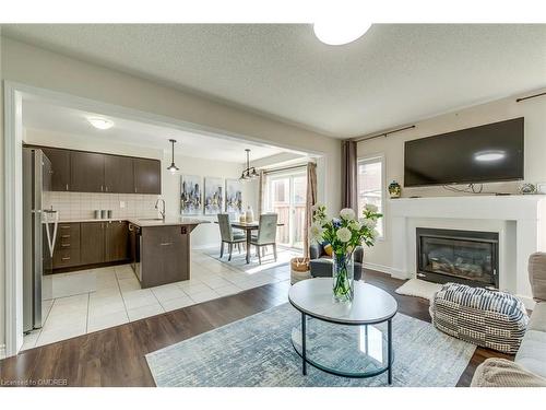 1663 Clitherow Street, Milton, ON - Indoor Photo Showing Living Room With Fireplace