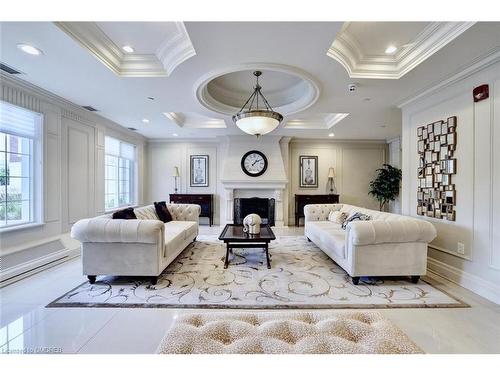 328-2300 Upper Middle Road, Oakville, ON - Indoor Photo Showing Living Room With Fireplace