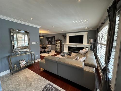 1-223 Picton Street E, Hamilton, ON - Indoor Photo Showing Living Room With Fireplace