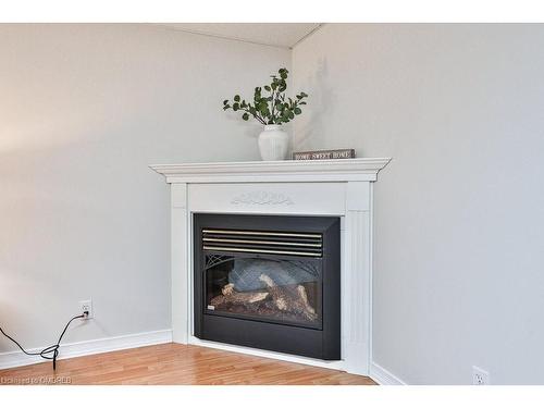 205 Ellis Crescent, Milton, ON - Indoor Photo Showing Living Room With Fireplace