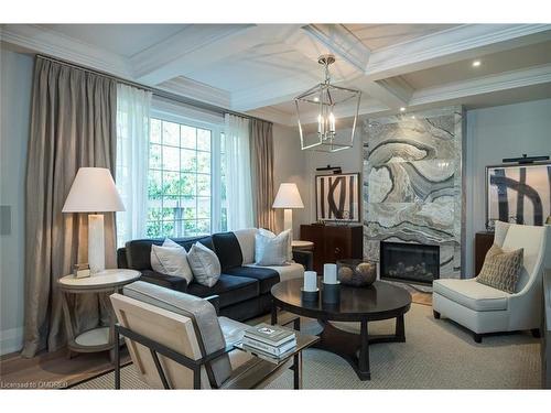 304 Mcgibbon Drive, Milton, ON - Indoor Photo Showing Living Room With Fireplace