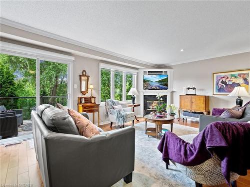 2252 Fairbairn Court, Oakville, ON - Indoor Photo Showing Living Room With Fireplace