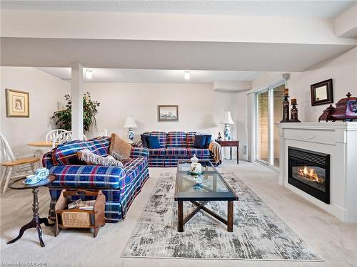 2252 Fairbairn Court, Oakville, ON - Indoor Photo Showing Living Room With Fireplace