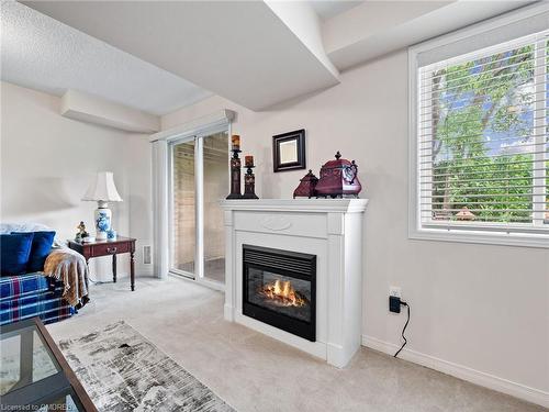 2252 Fairbairn Court, Oakville, ON - Indoor Photo Showing Living Room With Fireplace