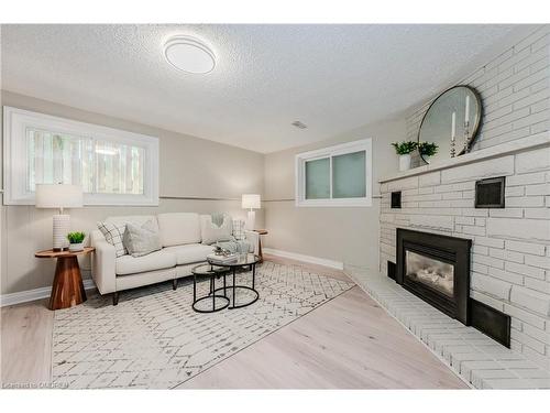 56 Grenville Avenue, Kitchener, ON - Indoor Photo Showing Living Room With Fireplace