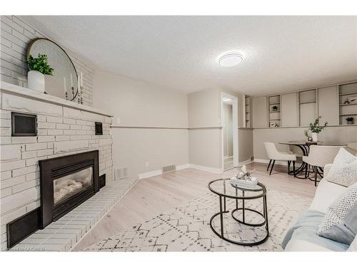 56 Grenville Avenue, Kitchener, ON - Indoor Photo Showing Living Room With Fireplace