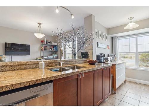 3121 Stornoway Circle, Oakville, ON - Indoor Photo Showing Kitchen With Fireplace With Double Sink