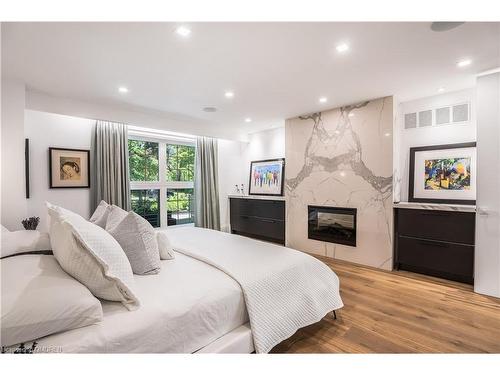 1242 Ravine Drive, Mississauga, ON - Indoor Photo Showing Bedroom With Fireplace