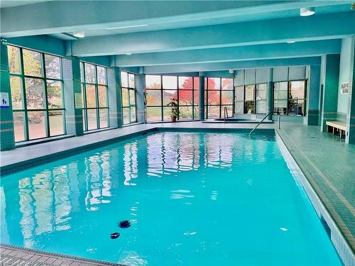 906-4460 Tucana Court, Mississauga, ON - Indoor Photo Showing Other Room With In Ground Pool