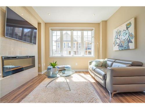 3101 Cornell Common, Oakville, ON - Indoor Photo Showing Living Room With Fireplace