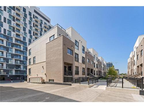 320-349 Wheat Boom Drive, Oakville, ON - Outdoor With Facade